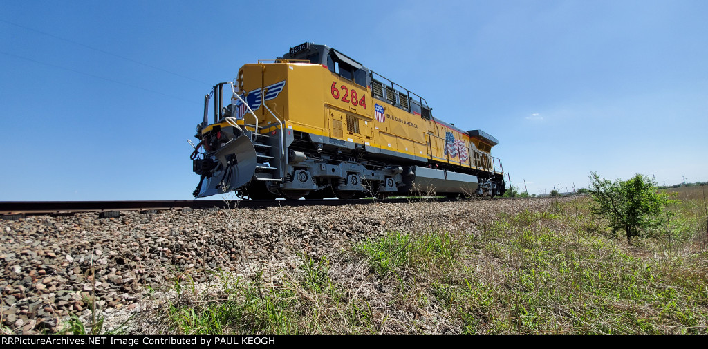 UP 6284 waiting to be picked up by the BNSF Railway side quartering photo on the Wabtec Delivery Track.